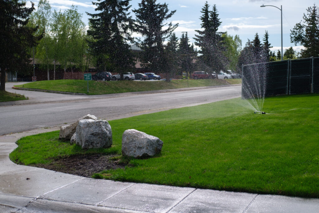 sprinkler watering lawn